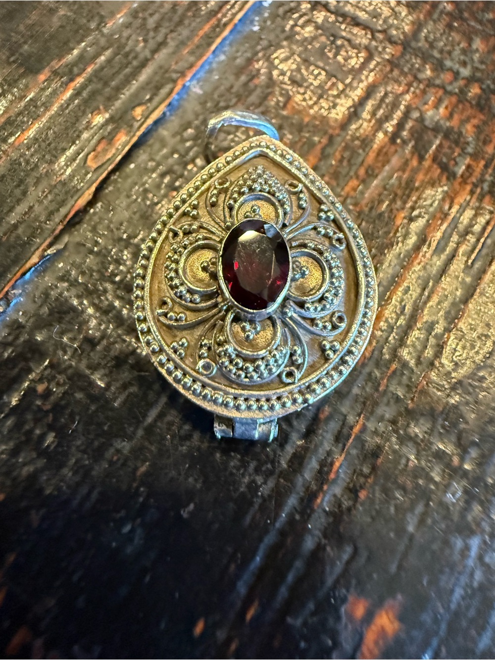 Vintage 925 Sterling silver ornate filigree Garnett color stone pill box pendant